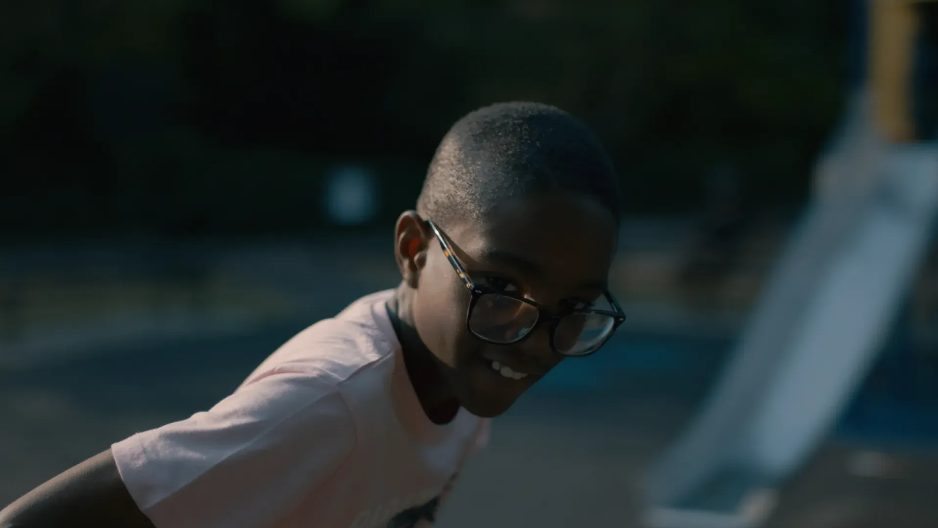 A young boy playing in the park