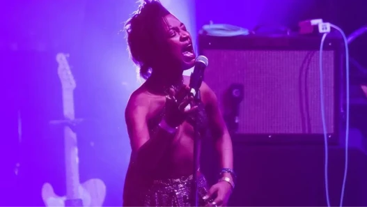 A woman singing into a microphone