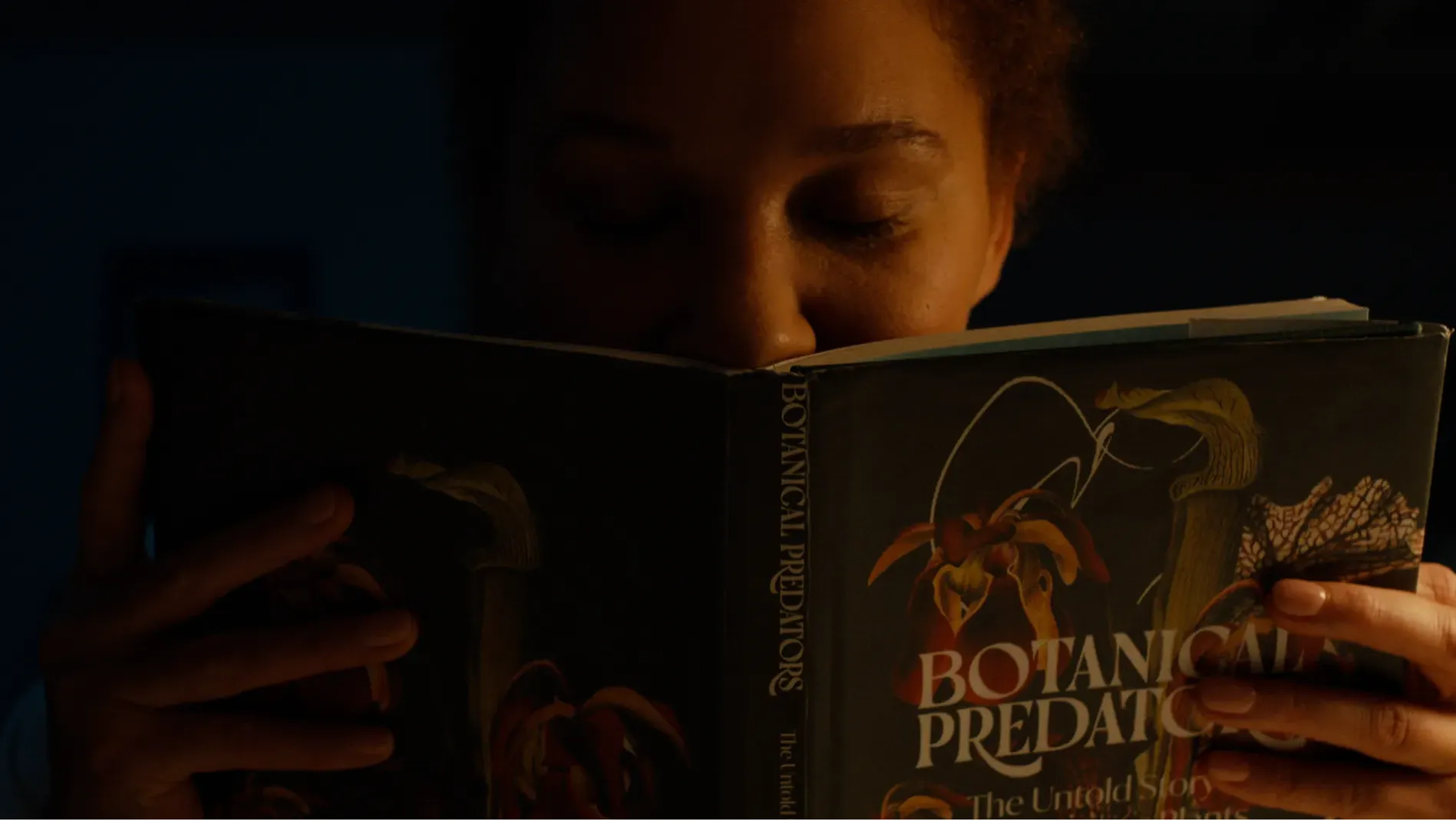 Hannah smells a book