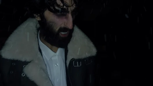 A man beginning to transform into a wolf