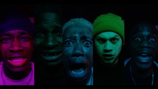 A group of young men are screaming in panic.
