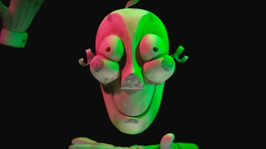 A creepy clown face floating in the air with dramatic lighting