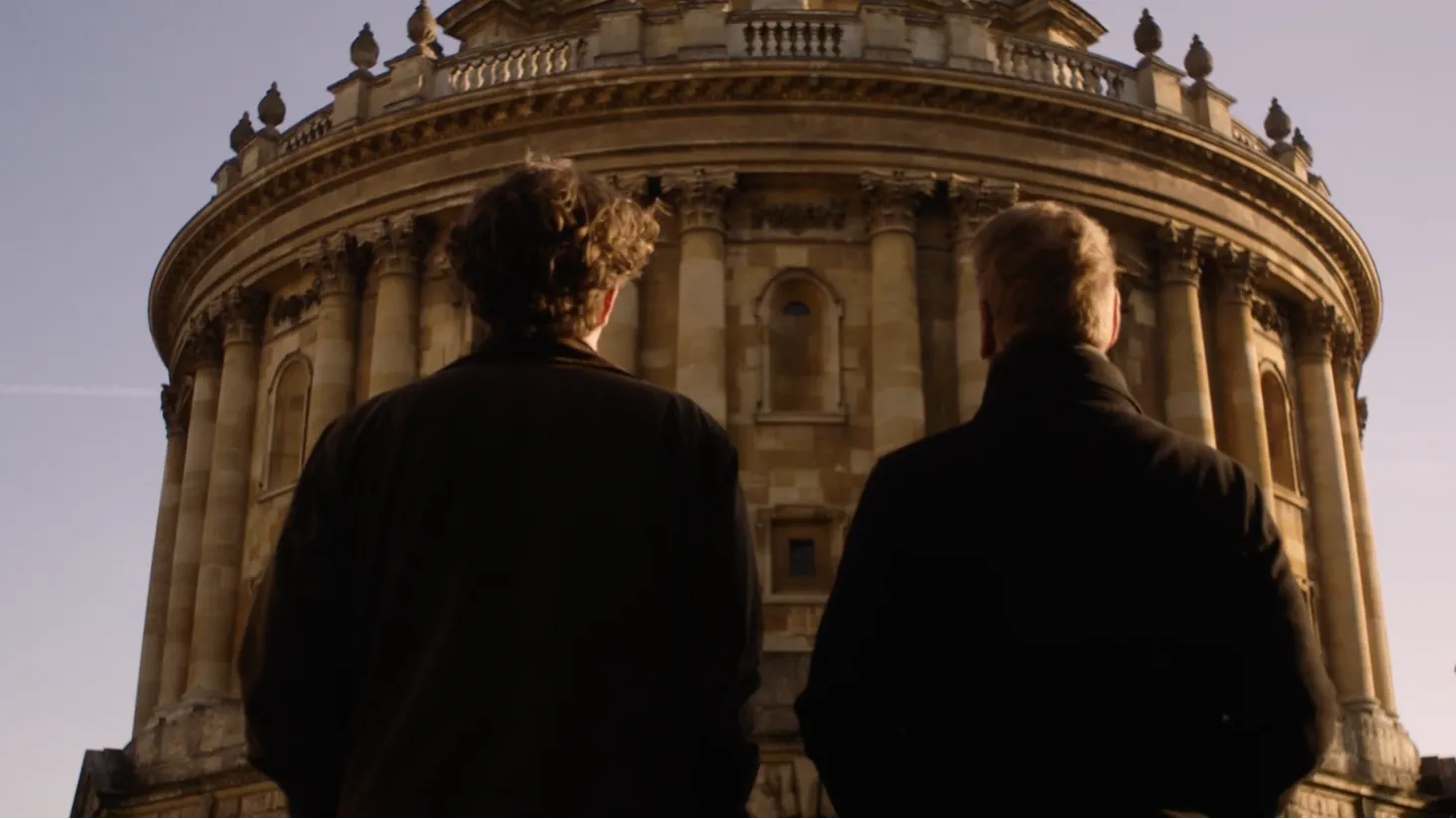 Daniel McNamee and Shaun Paul McGrath as Otto and John in front of the Radcliffe Camera, Oxford