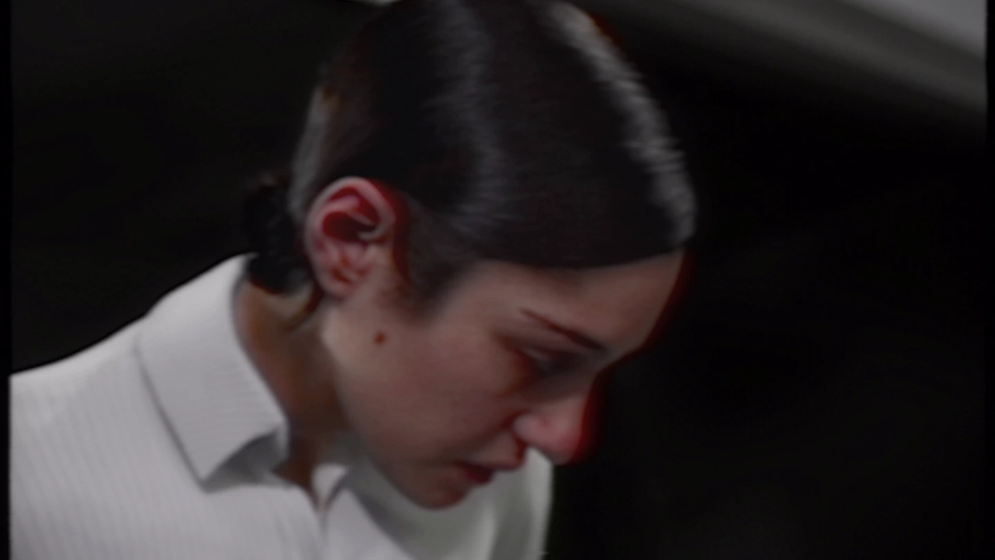 The protagonist is looking down.