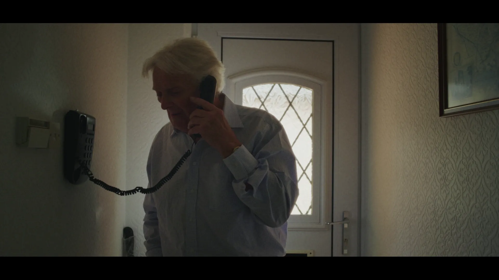 Robert making a phone call.