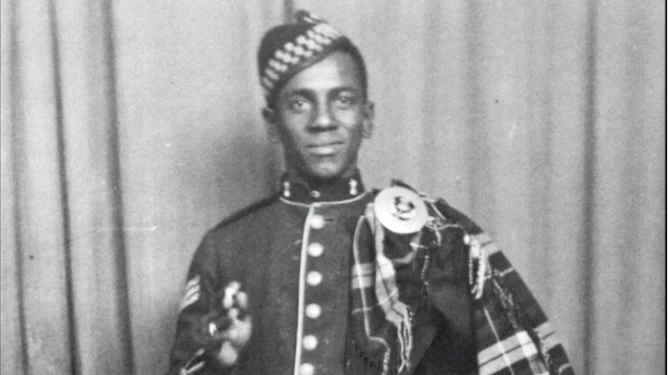 John Stephen Mingo in full Scots regalia