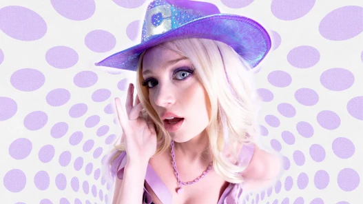 A woman wearing a purple cowboy hat in front of a white background with swirling purple dots.