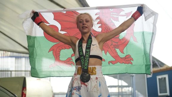 Female boxer with Welsh Flag