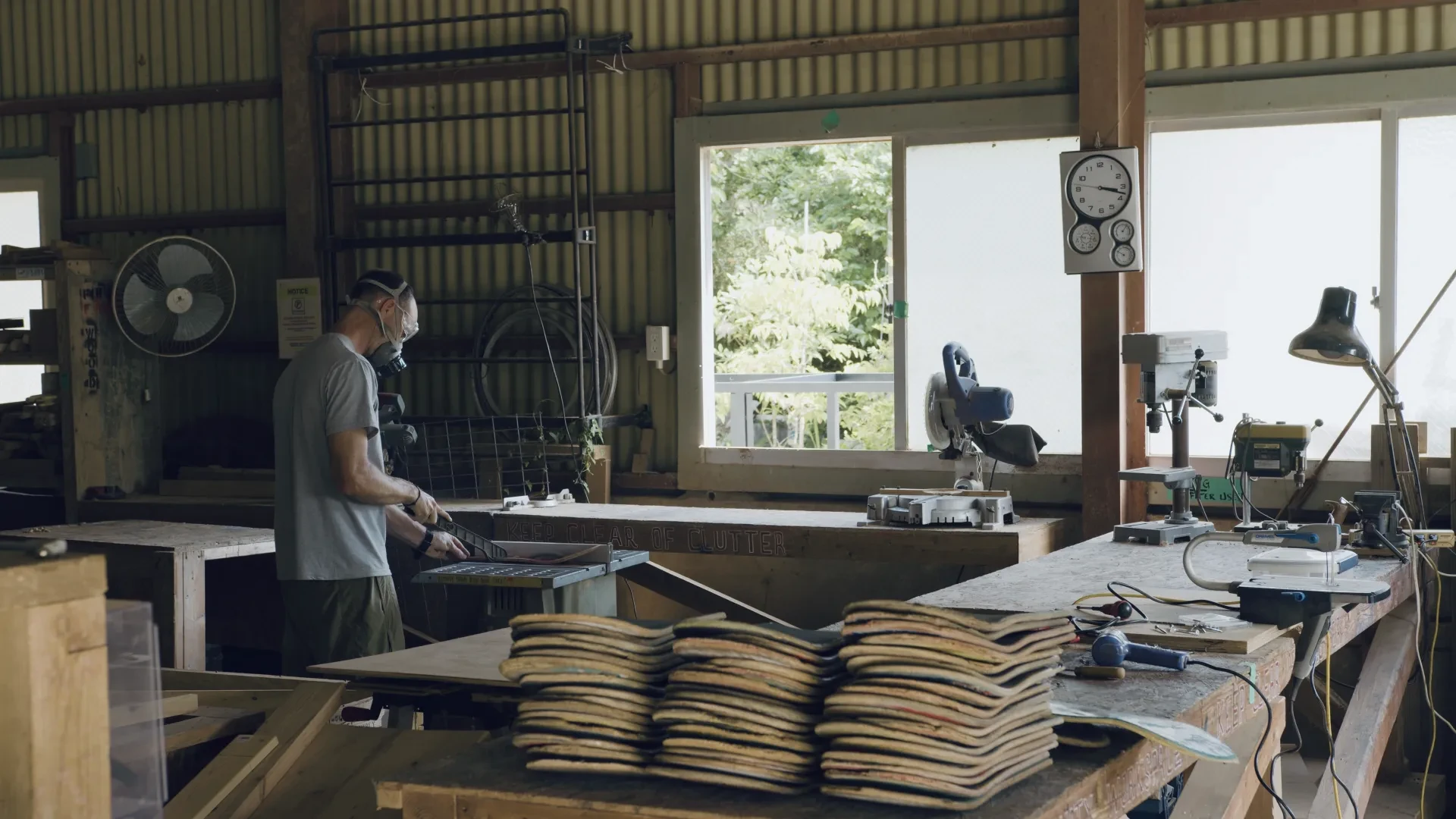 A skater turning old skateboards into woodwork