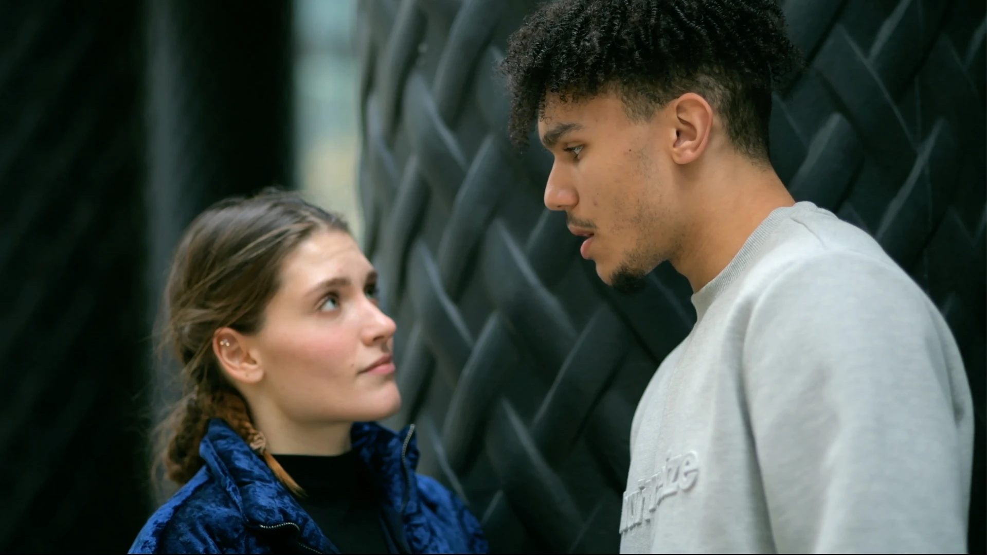 A male and female couple having an intense conversation