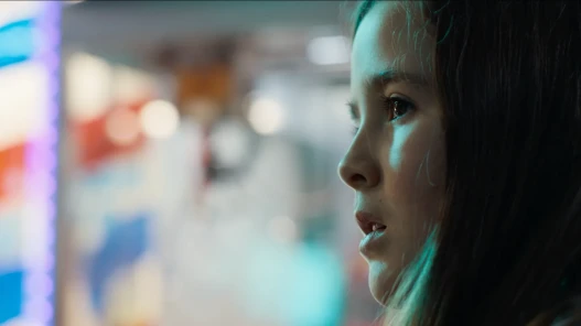Girl in seaside amusement arcade