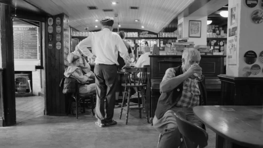 People drinking and socialising in a pub