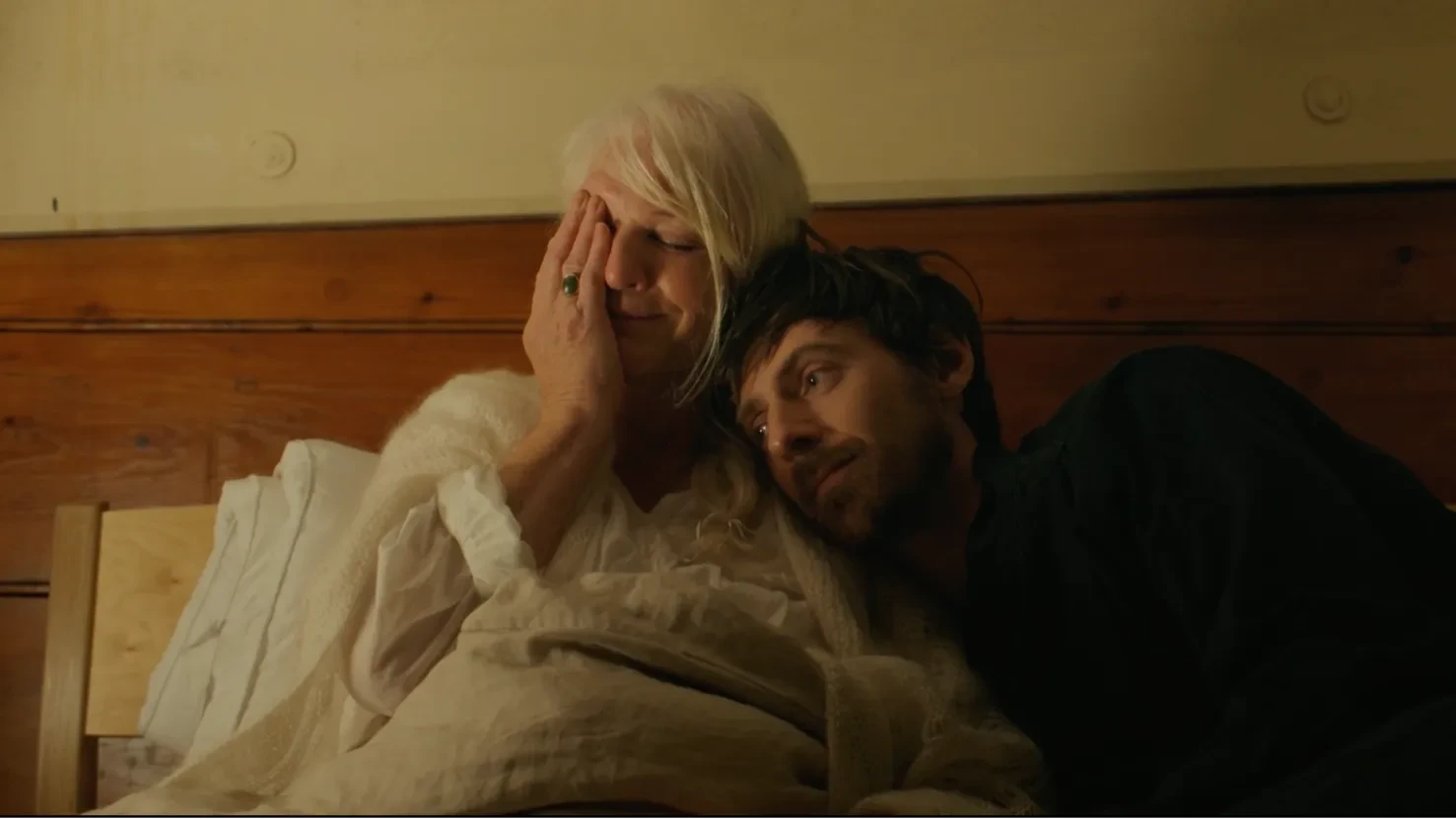 man and woman in bed