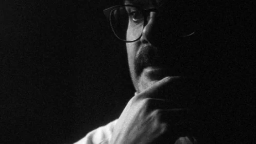 Black and white 16mm image showing the DJ Simon Eilbeck
