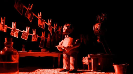 The shopkeeper is fascinated by the photograph of the jungle he just developed