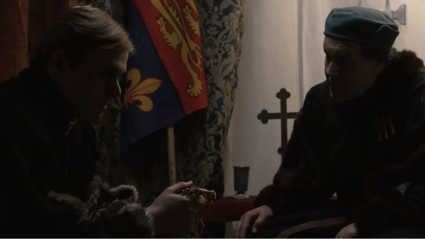 Prince Richard and Sir Robert discuss strategy in their tent