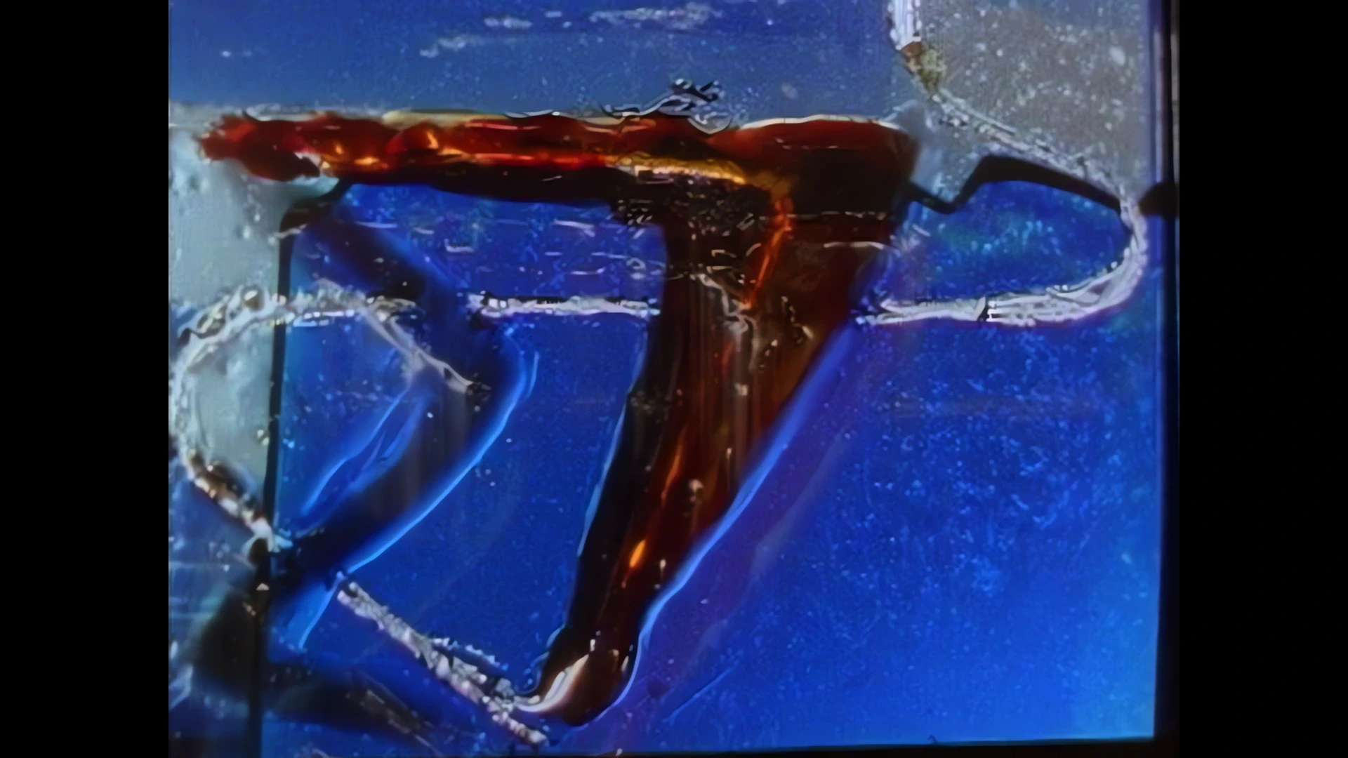 Abstract red and brown shapes on a blue ground