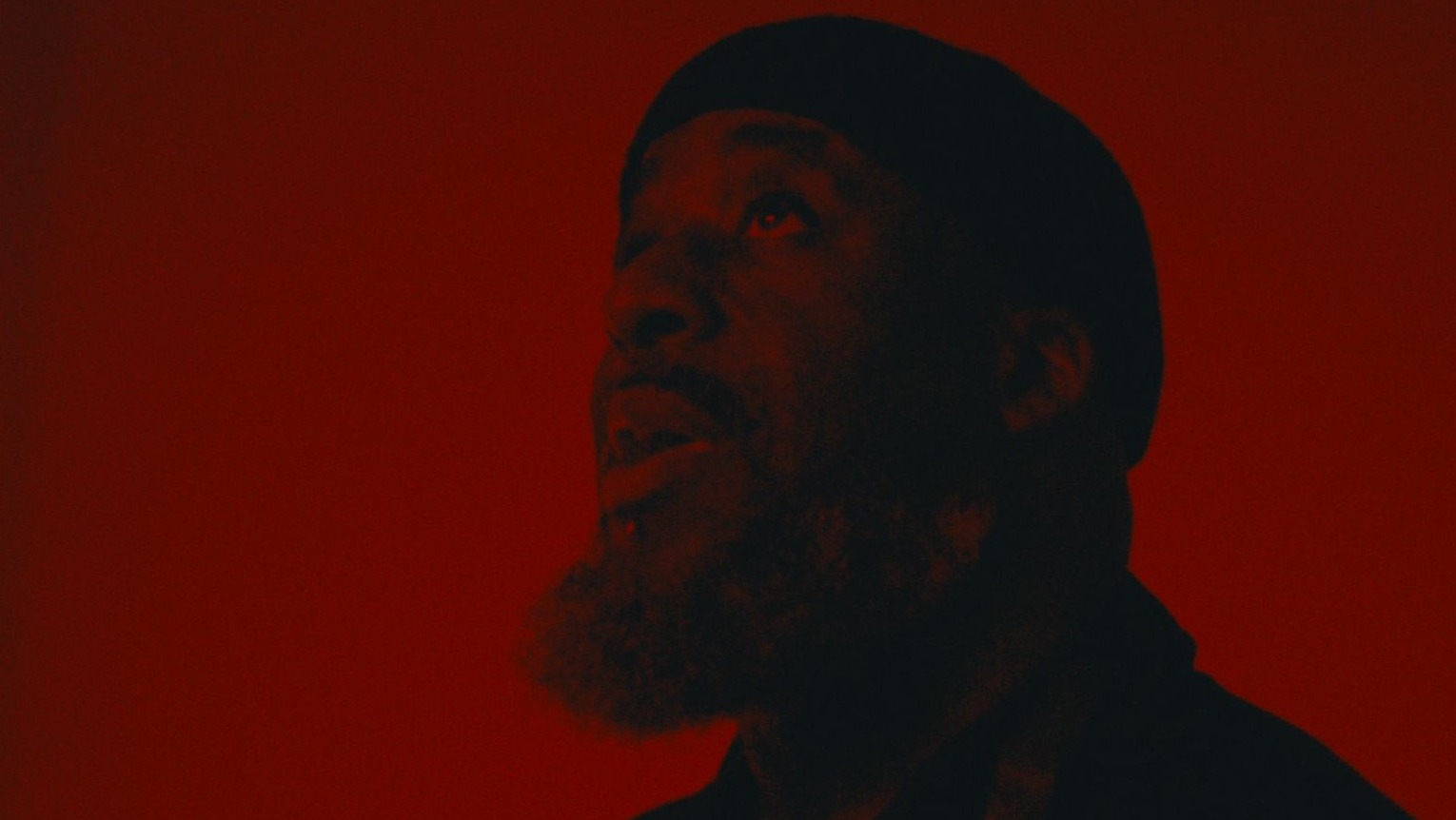 Ajamu X, Holding the Frame