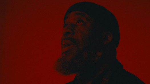 Ajamu X, Holding the Frame