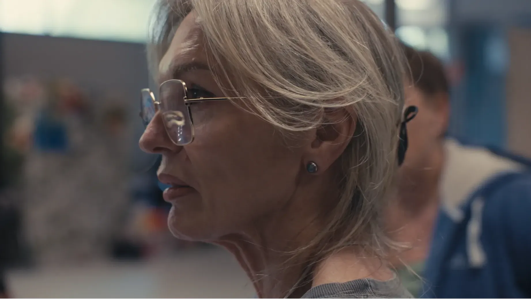 Close-up of a woman's face in group session