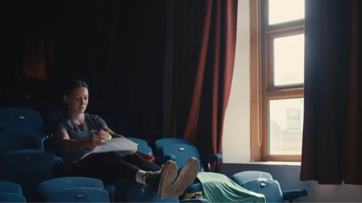 A woman reading through script