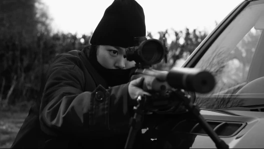 A woman with a rifle