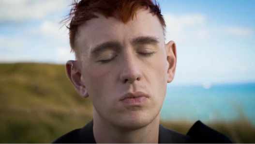 A portrait photograph of musician Patrick Wolf