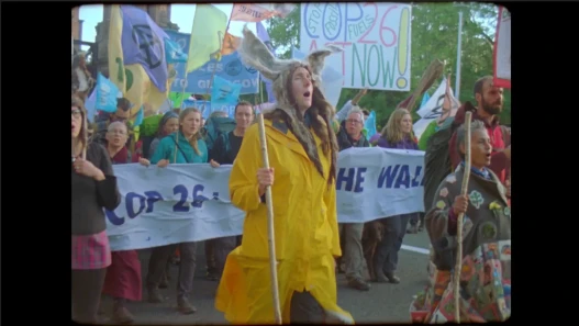 Climate activist and Artist Barbara Keal leads the walks to COP26 in Glasgow
