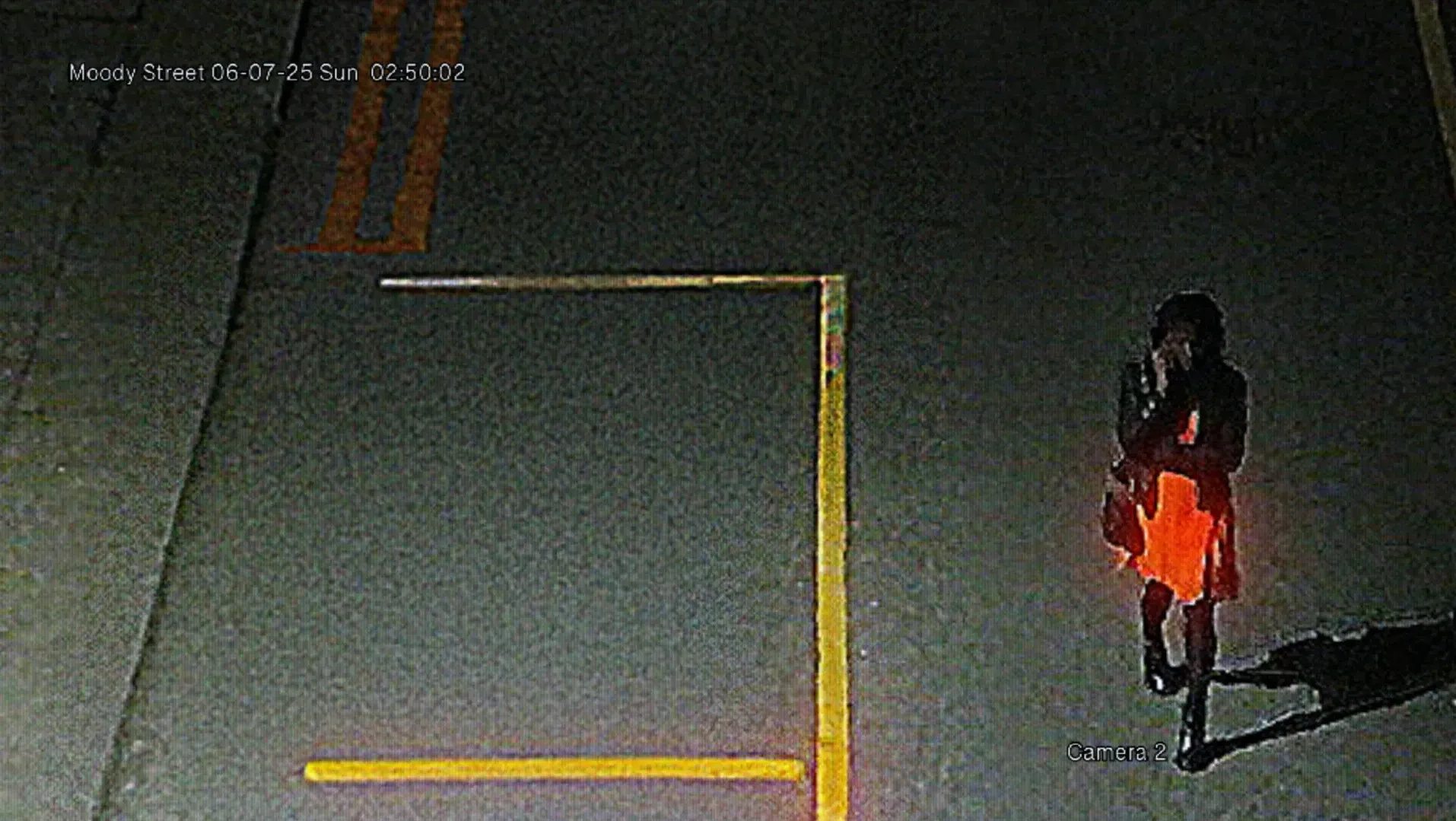 'Carolyn' walking alone down a deserted street at night