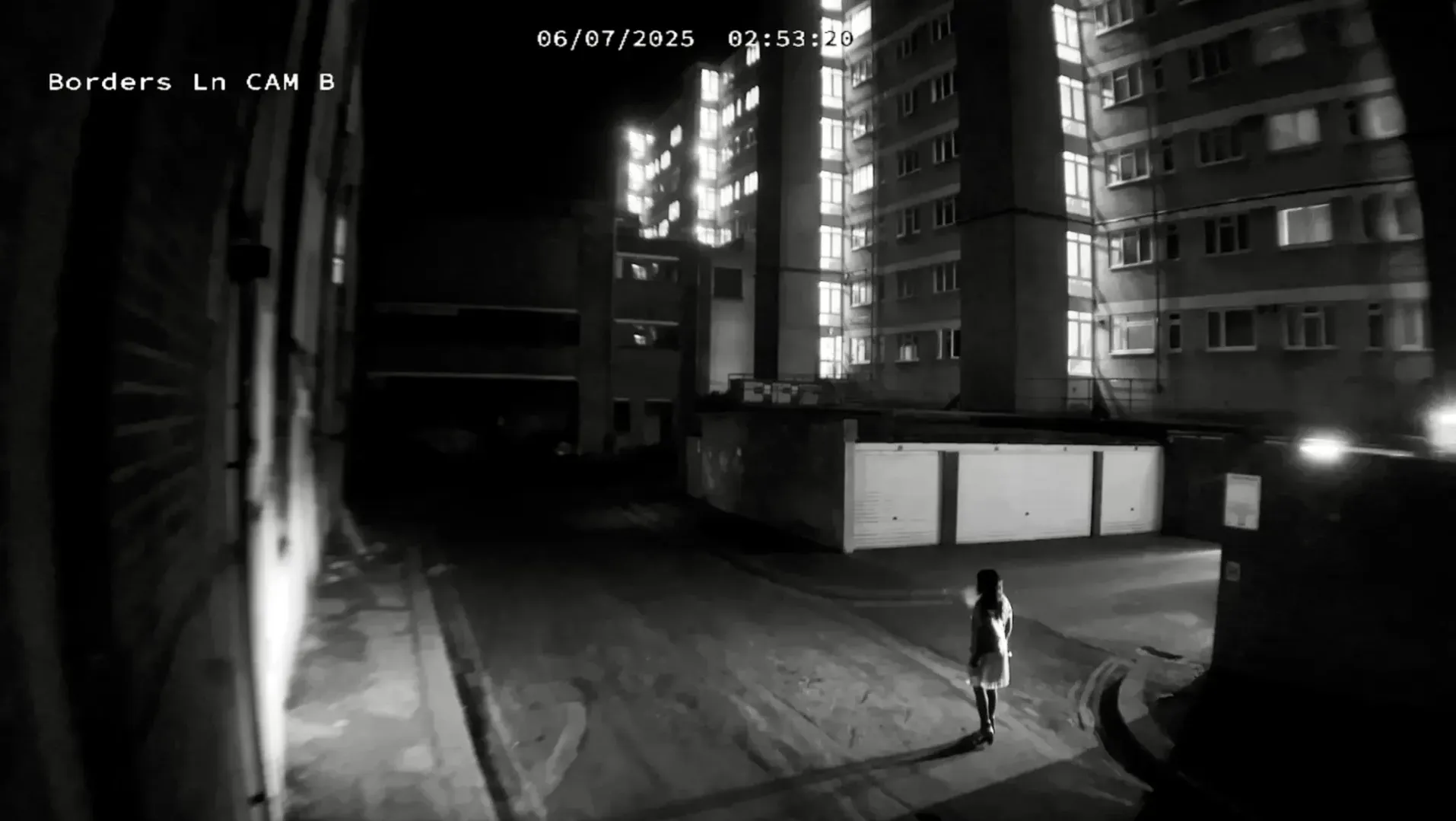 'Carolyn' alone on a deserted street at night