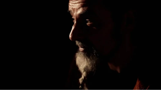 The documentary's principle subject looking towards the unknown,.