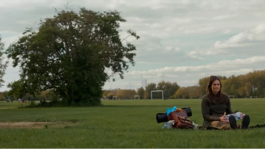 Elenya, the self-proclaimed Elvish Princess, sitting at Hackney Marshes.