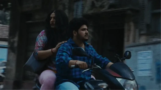 woman and man on a motorbike